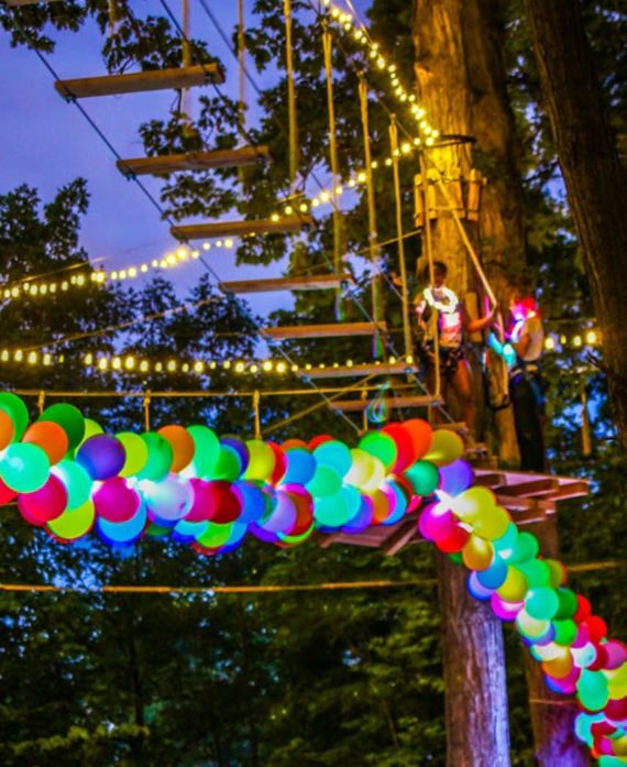 Adventure Park with glowing lights and balloons