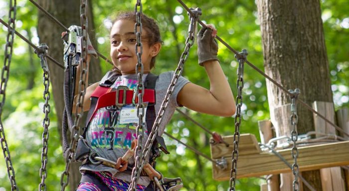 Young girl on ropes course