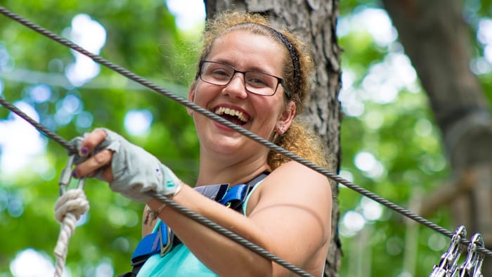 Woman laughing at adventure park