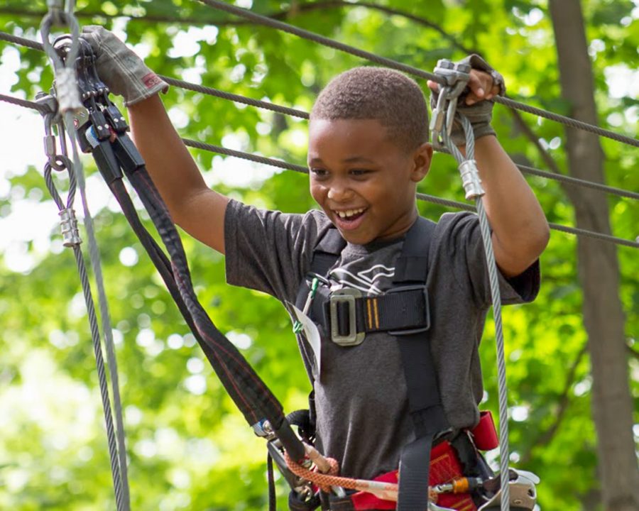 Young boy on ropes course