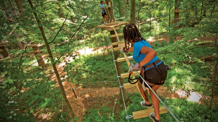 Girl on ropes course